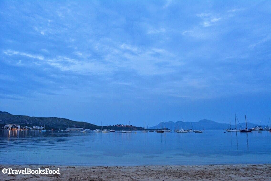 This is the photo of the Port De Pollenca Harbour during sunset. You can see small boats in this photo in the distance