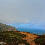 This is a photo of Cabo Da Roca, the western most point of Continental Europe. You see the cliffs hugging the clouds with the sea in the distance