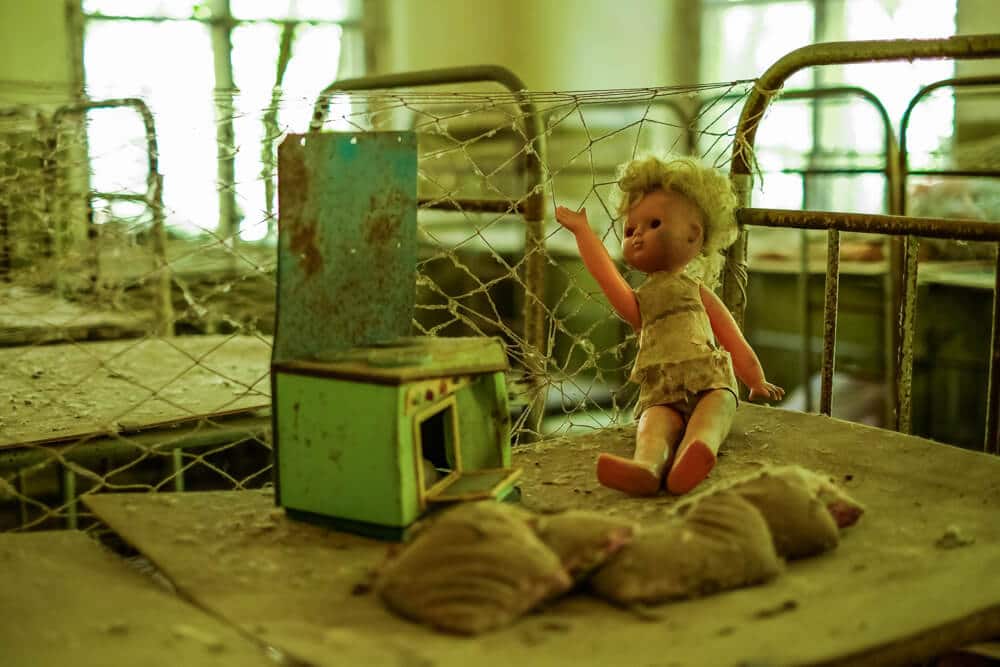 A photo of an abandoned doll in the ghost town of Pripyat